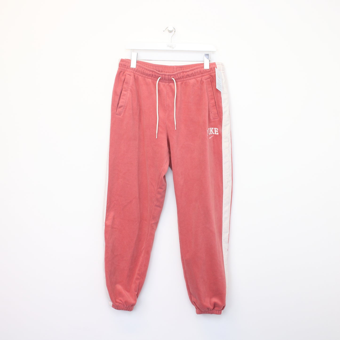 Vintage Nike joggers in pink and white. Best fits XL