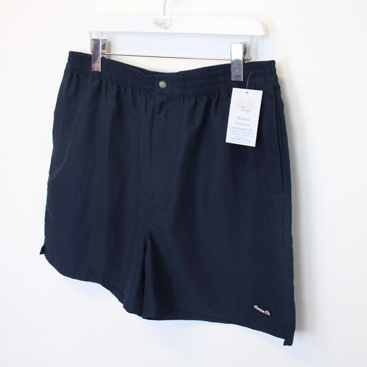 Vintage Ellesse shorts in navy. Best fits XL