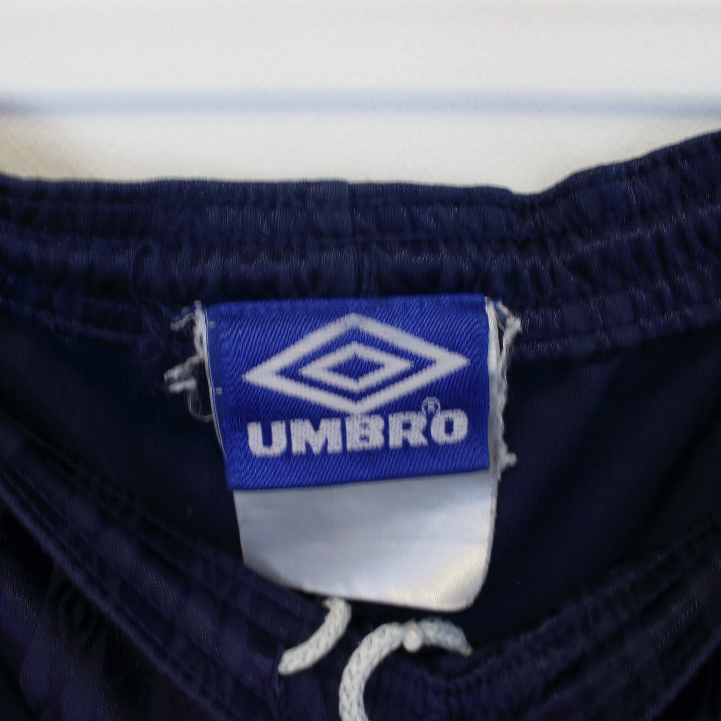 Vintage Umbro shorts in navy. Best fits L