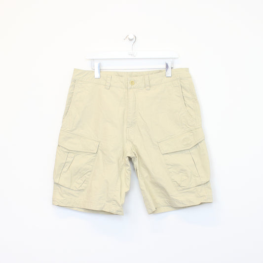 Vintage Timberland cargo shorts in beige. Best fits 35