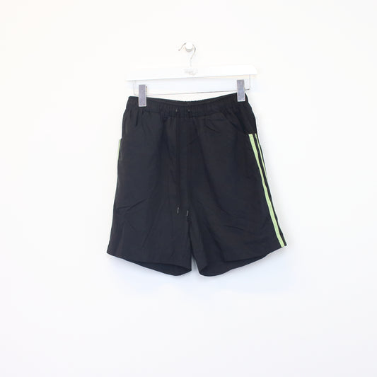 Vintage Adidas shorts in black and green. Best fits M