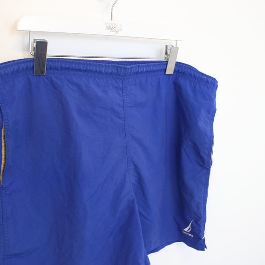 Vintage Nautica shorts in blue. Best fits XL