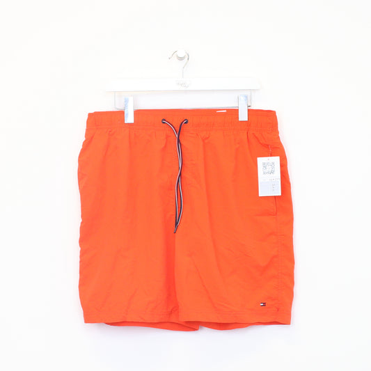 Vintage Tommy Hilfiger shorts in orange. Best fits XL