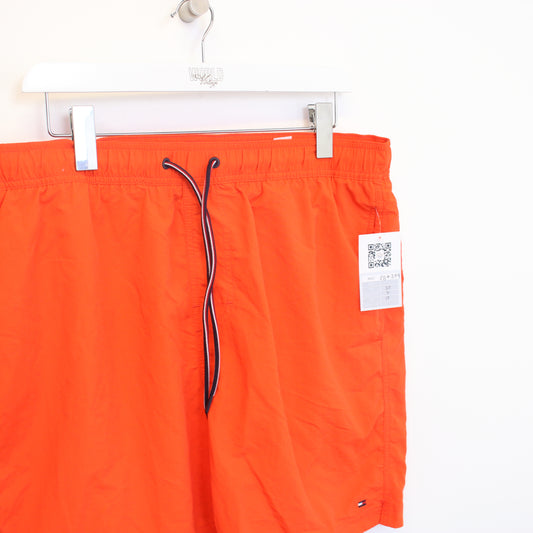 Vintage Tommy Hilfiger shorts in orange. Best fits XL