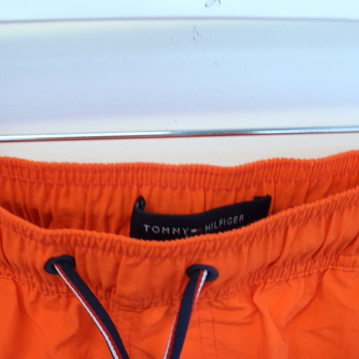 Vintage Tommy Hilfiger shorts in orange. Best fits XL