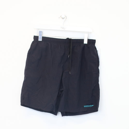 Vintage Speedo shorts in black. Best fits M