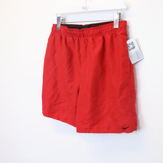 Vintage Nike shorts in red. Best fits M