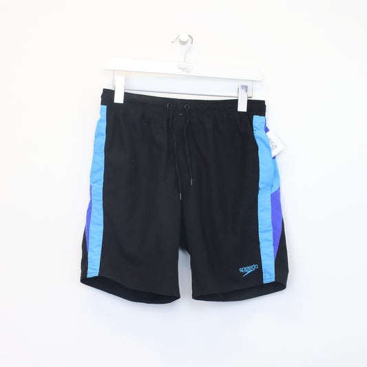 Vintage Speedo shorts in black. Best fits M