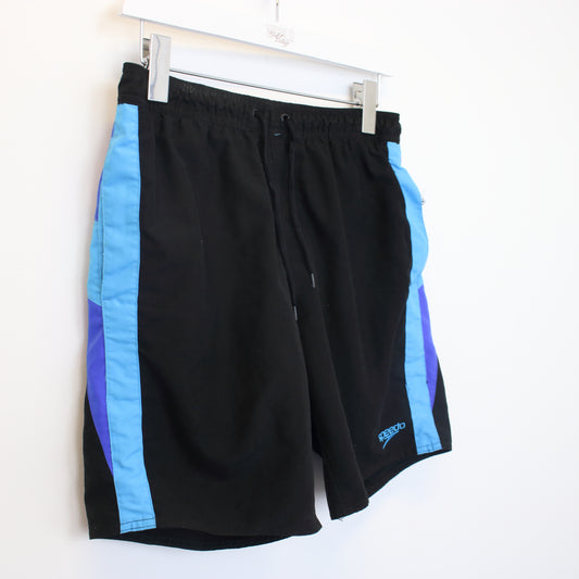 Vintage Speedo shorts in black. Best fits M