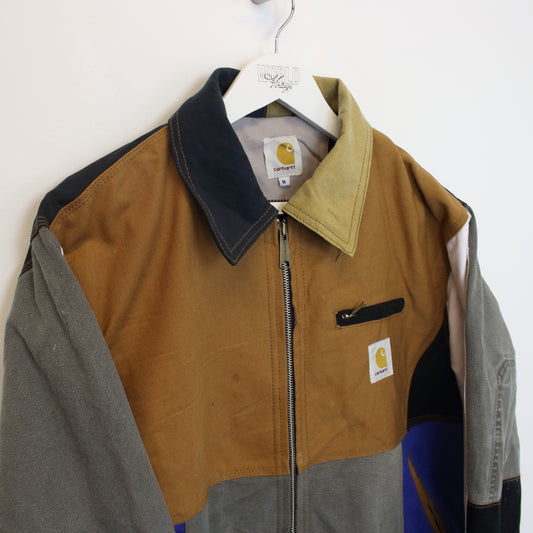 Vintage Carhartt rework jacket in multi colour. Best fits M