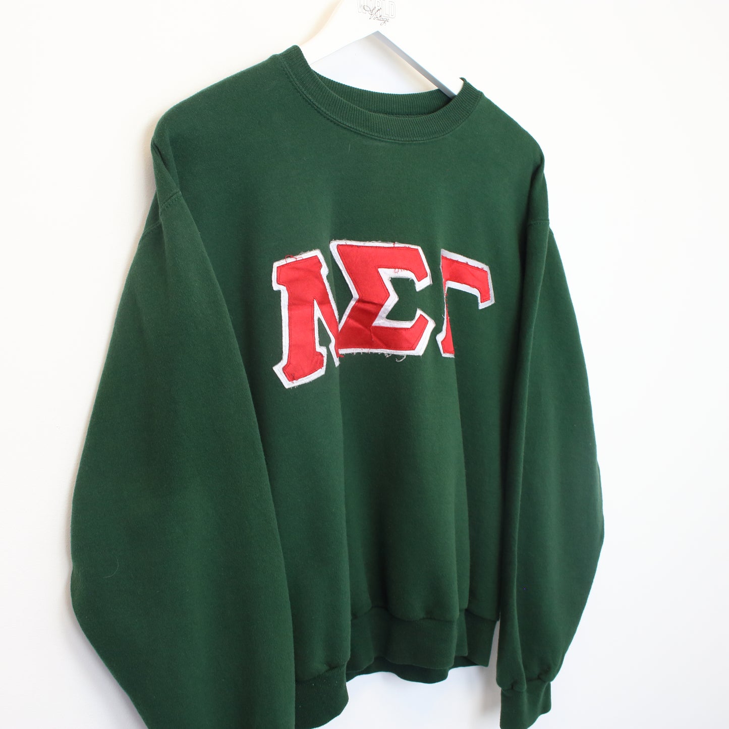 Vintage Jerzees college sweatshirt in green. Best fits S