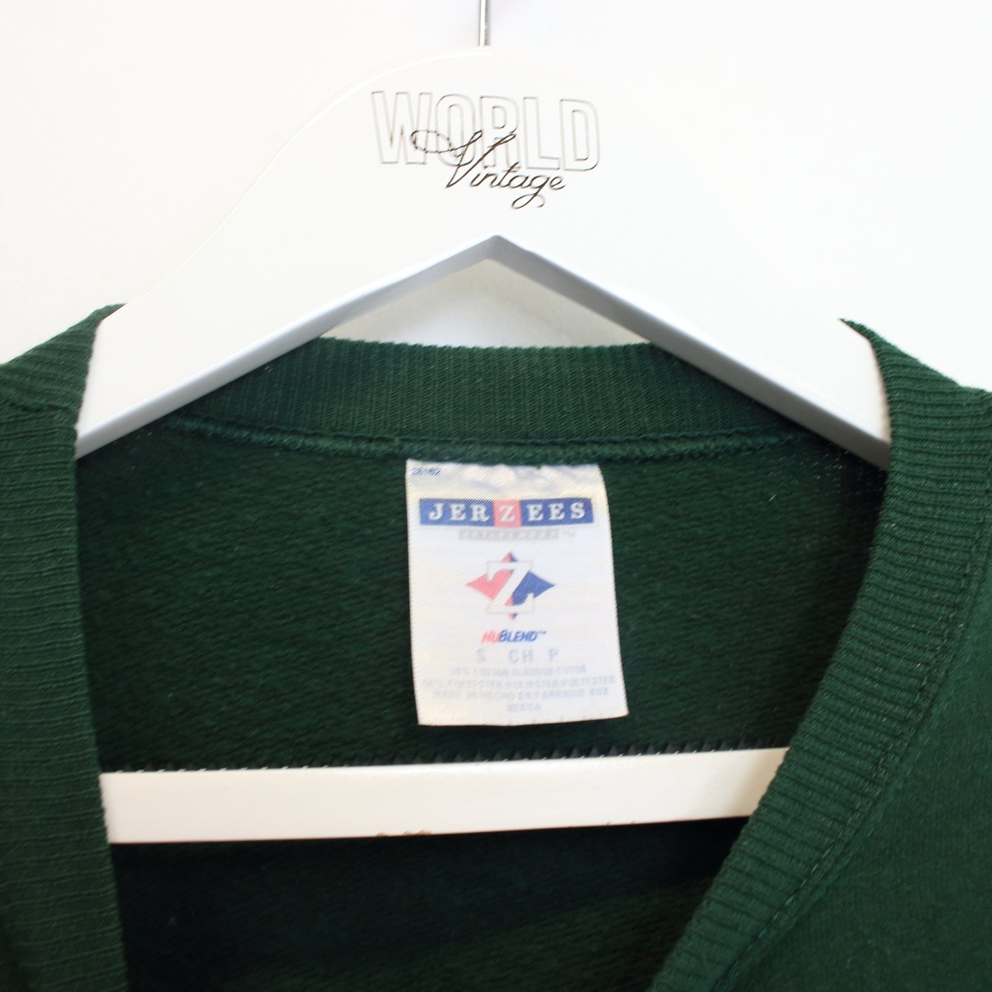 Vintage Jerzees college sweatshirt in green. Best fits S