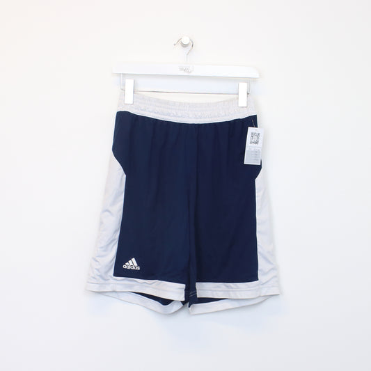 Vintage Adidas shorts in navy and white. Best fits M