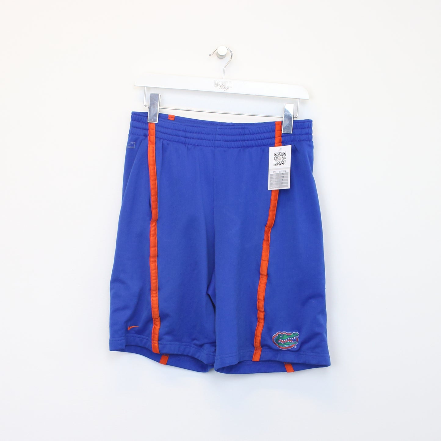 Vintage Nike shorts in blue and orange. Best fits M