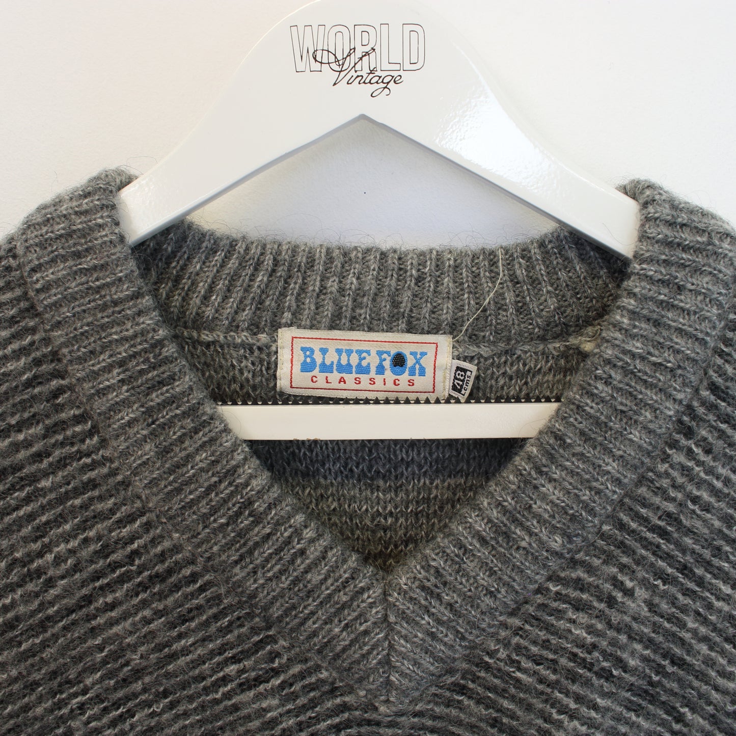 Vintage Blue Fox knit sweatshirt in multi colours. Best fits L