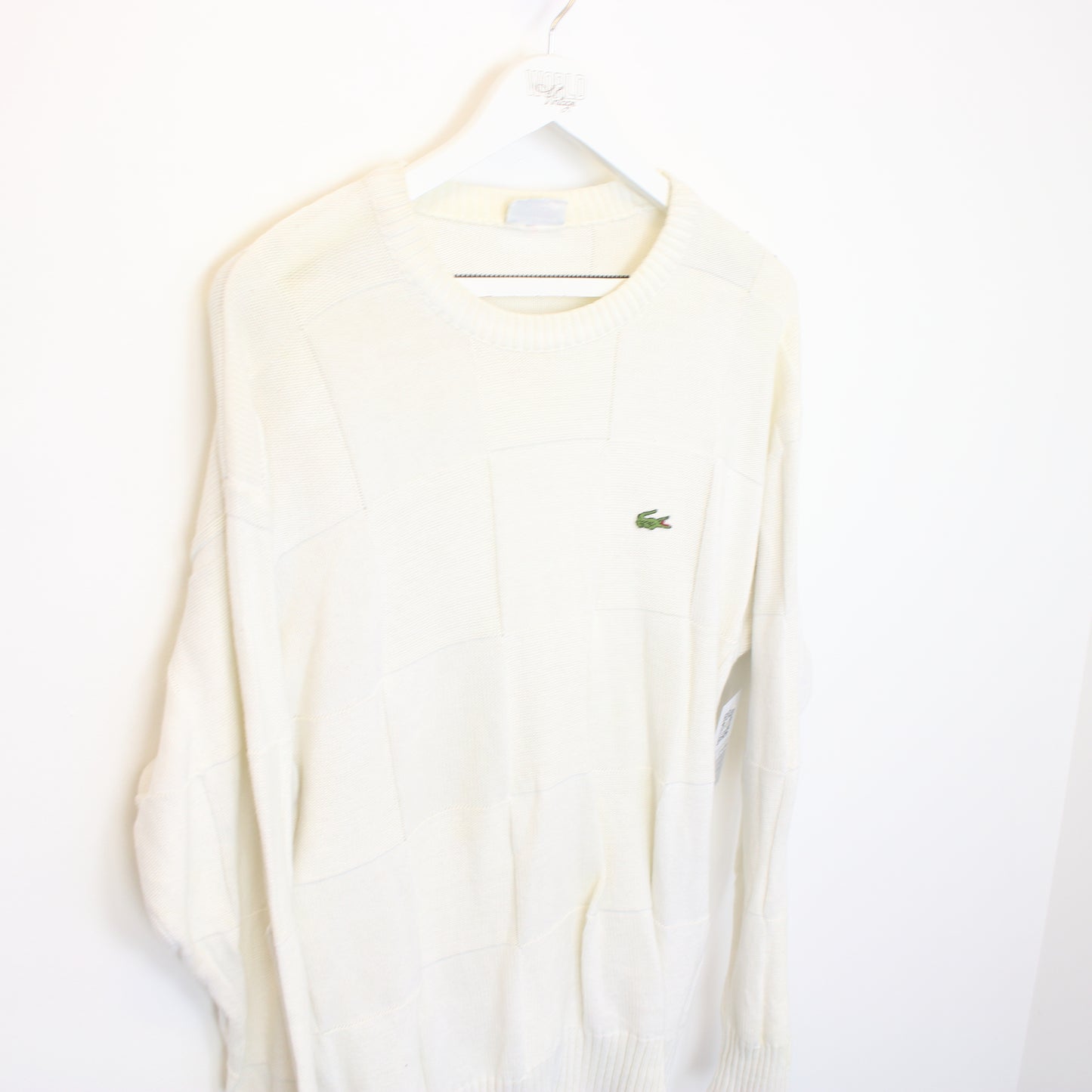 Vintage Lacoste knit sweatshirt in white. Best fits S