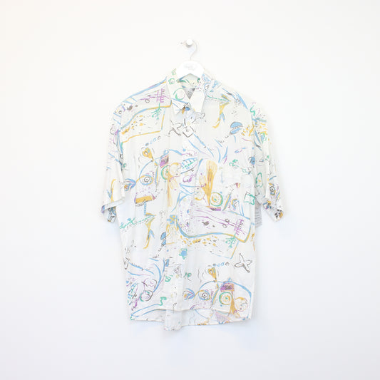 Vintage Dornbusch Hawaiian shirt in white, blue, and yellow. Best fits L