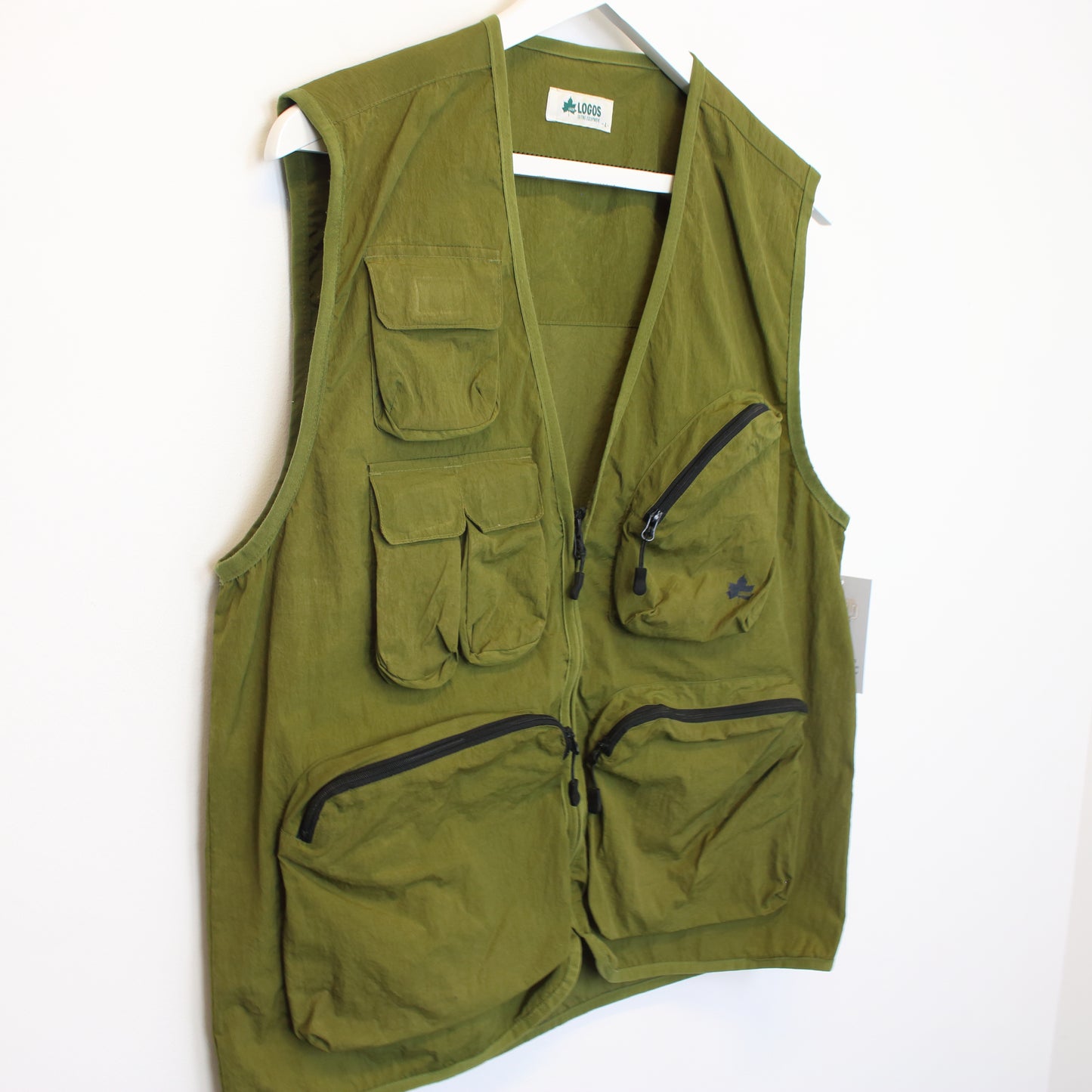 Vintage Logos vest in green. Best fits L