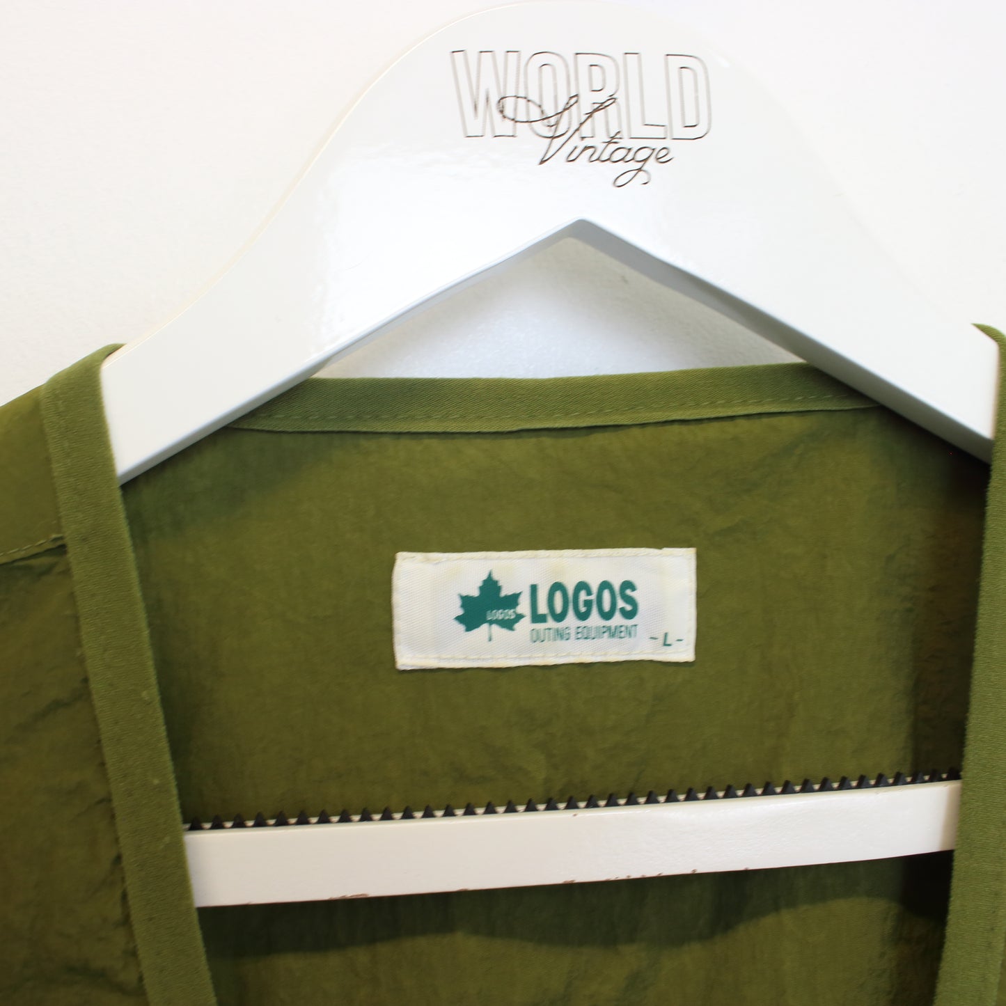 Vintage Logos vest in green. Best fits L