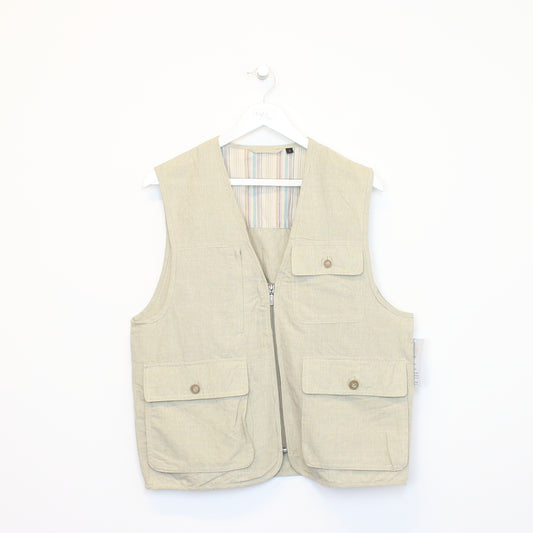 Vintage Unbranded vest in beige. Best fits L