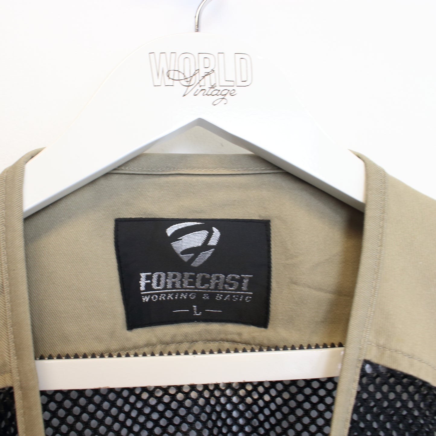 Vintage Forecast mesh vest in black and brown. Best fits L