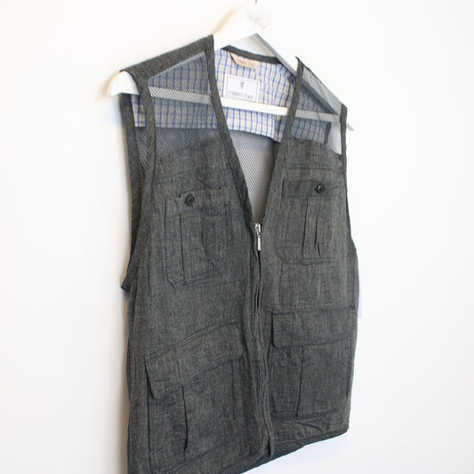 Vintage Current Stage mesh vest in grey. Best fits L