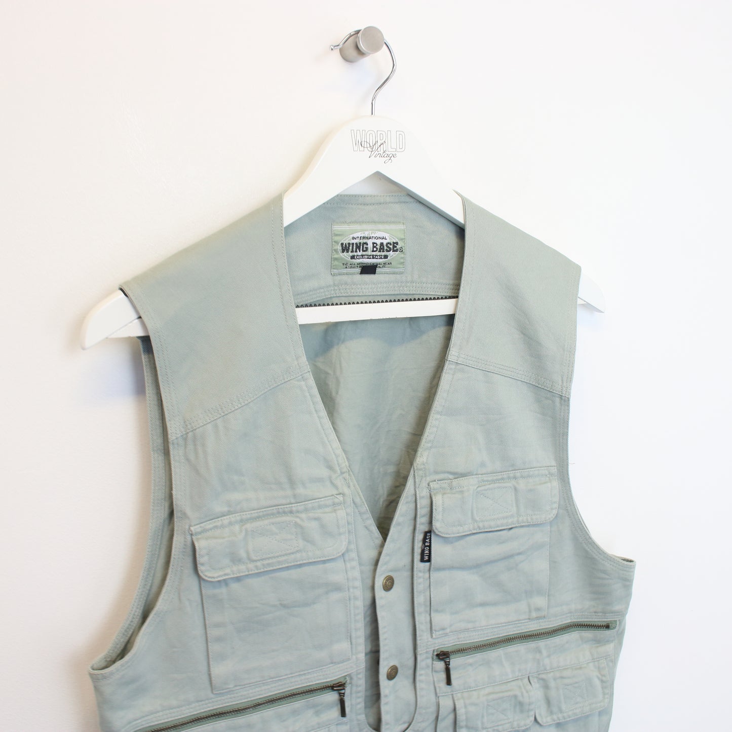 Vintage Wing Base vest in grey. Best fits M