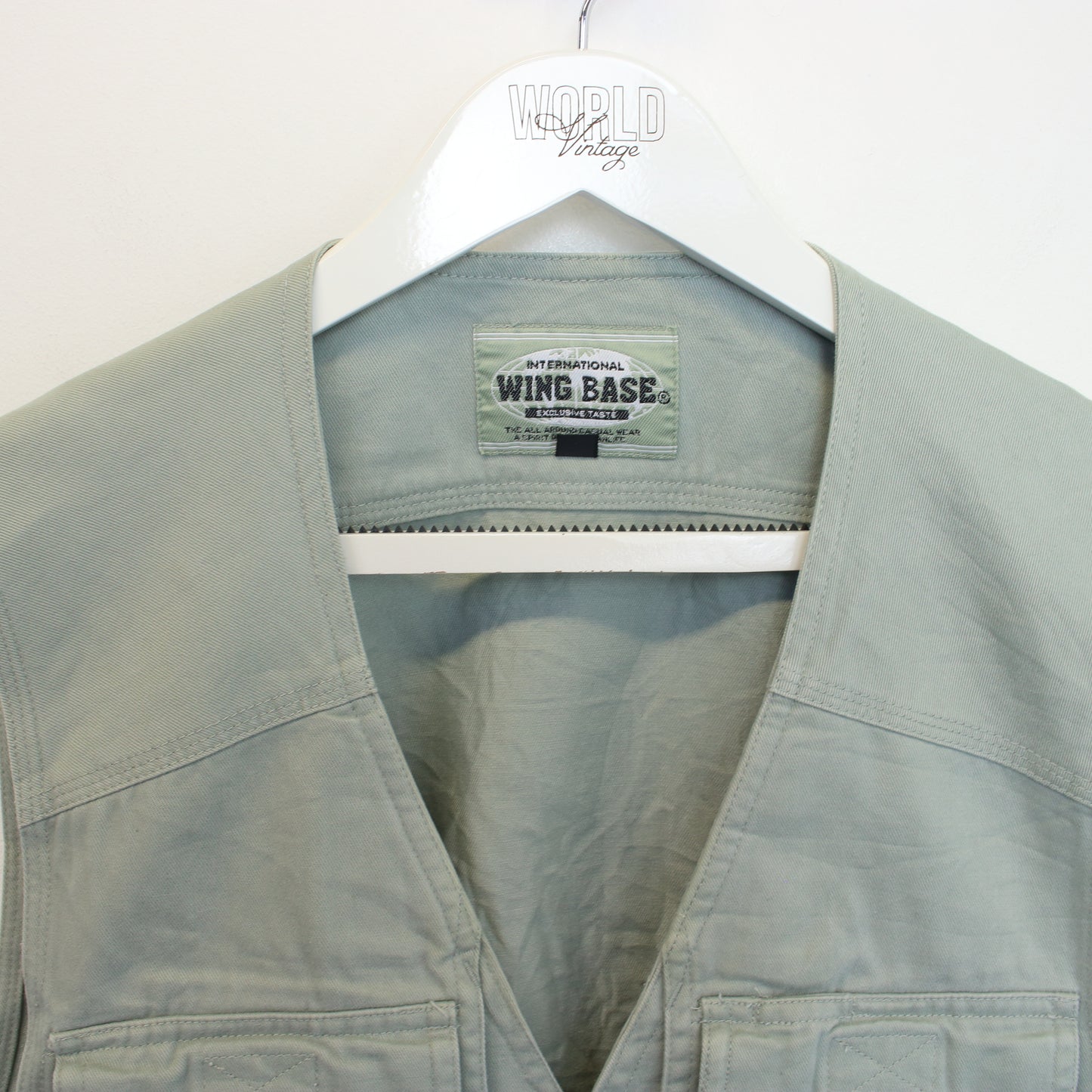 Vintage Wing Base vest in grey. Best fits M