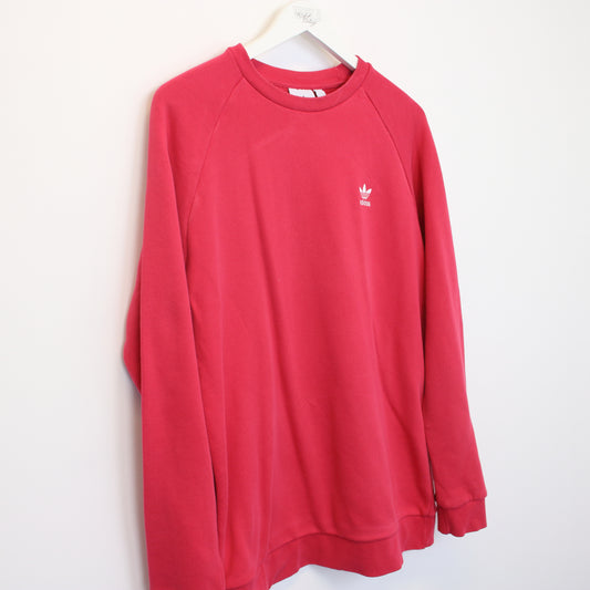 Vintage Adidas sweatshirt in red/pink. Best fits M