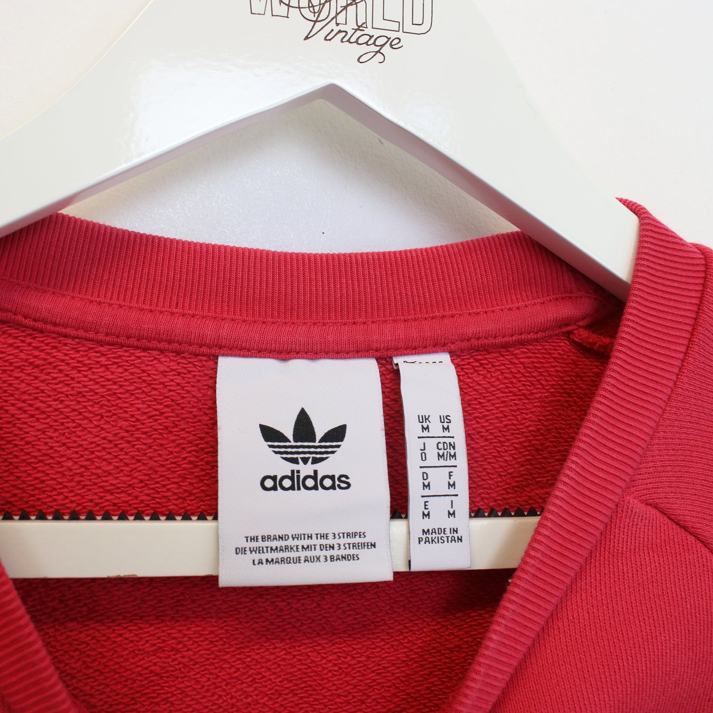 Vintage Adidas sweatshirt in red/pink. Best fits M