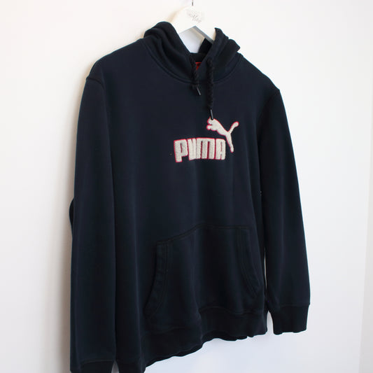 Vintage Womens Puma spell out hoodie in black. Best fits M