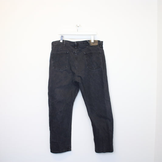 Vintage Wrangler jeans in black. Best fit W40