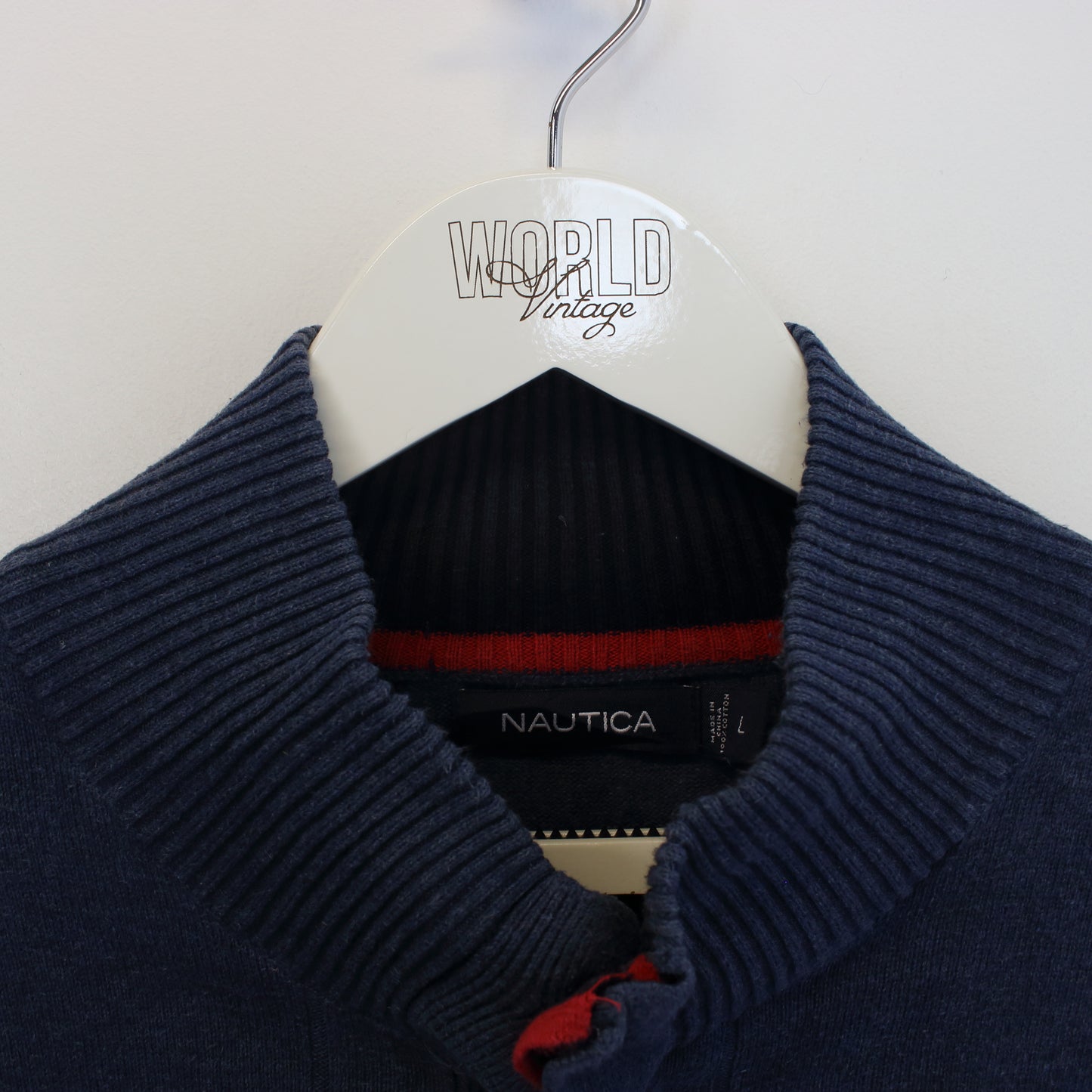 Vintage Nautica knitted quarter button sweatshirt in blue. Best fits L