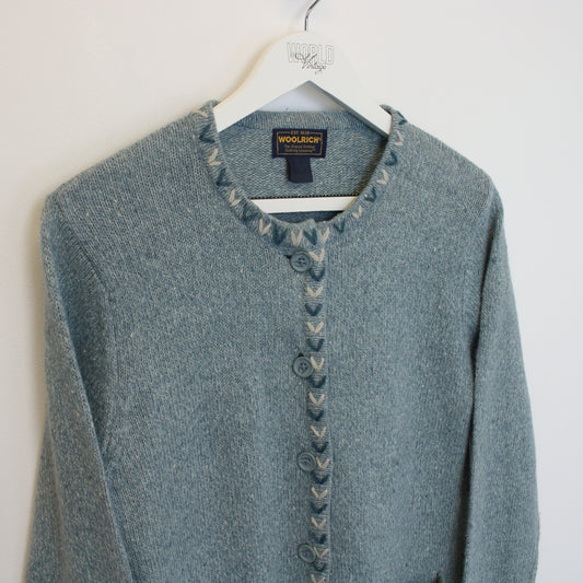 Vintage women's Woolrich knitted sweatshirt in blue. Best fits S