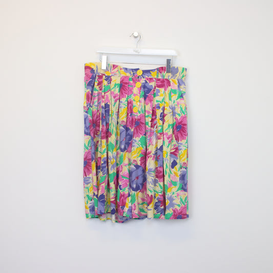 Vintage unbranded floral skirt . Best fits W36