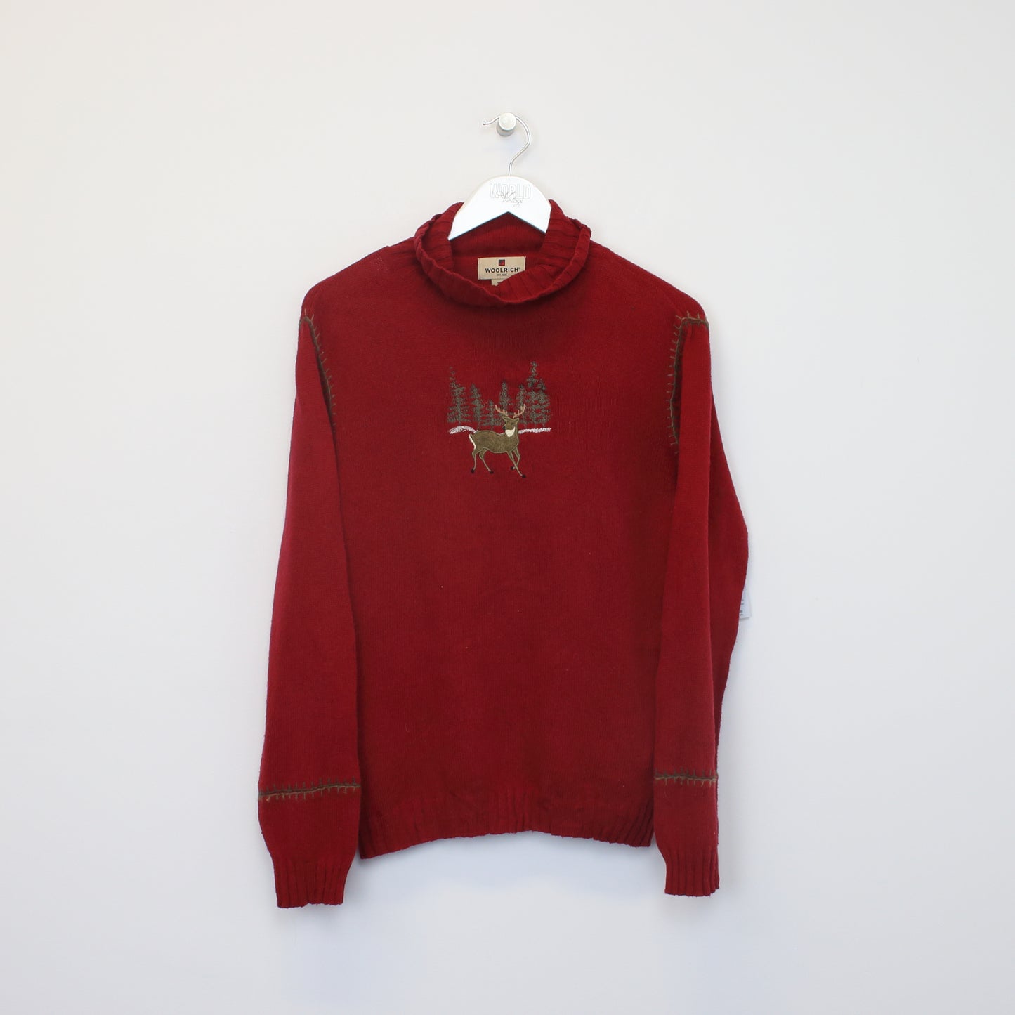 Vintage women's Woolrich knitted sweatshirt in red. Best fits M