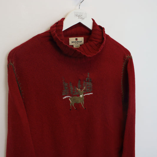 Vintage women's Woolrich knitted sweatshirt in red. Best fits M