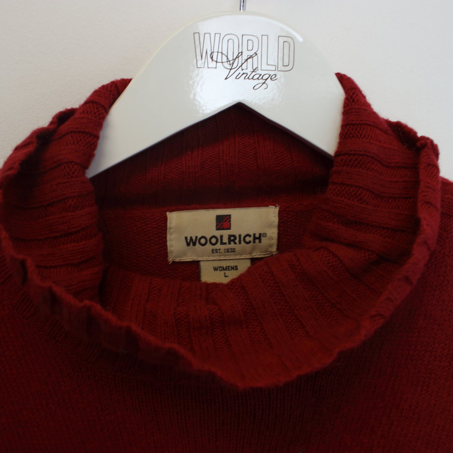 Vintage women's Woolrich knitted sweatshirt in red. Best fits M