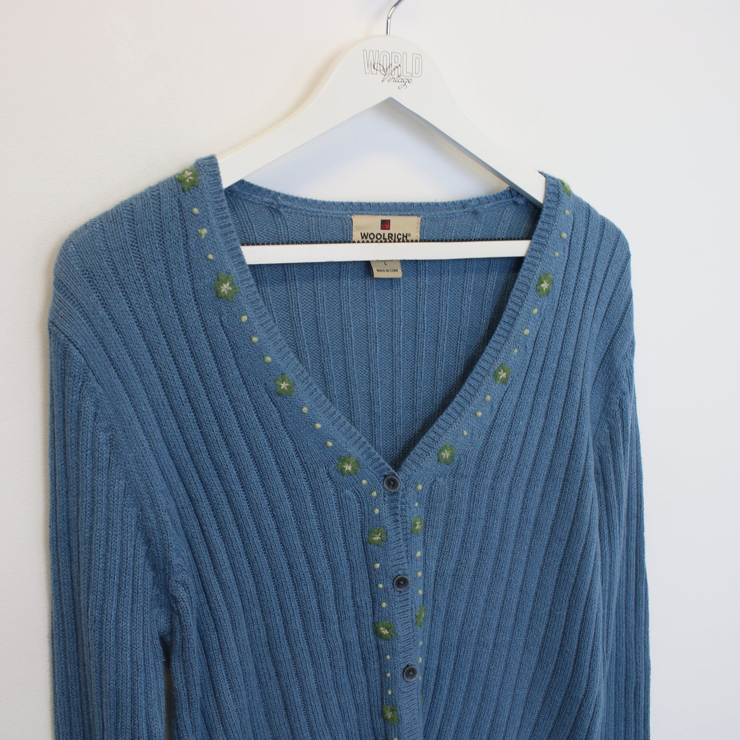 Vintage women's Woolrich knitted sweatshirt in blue. Best fits S