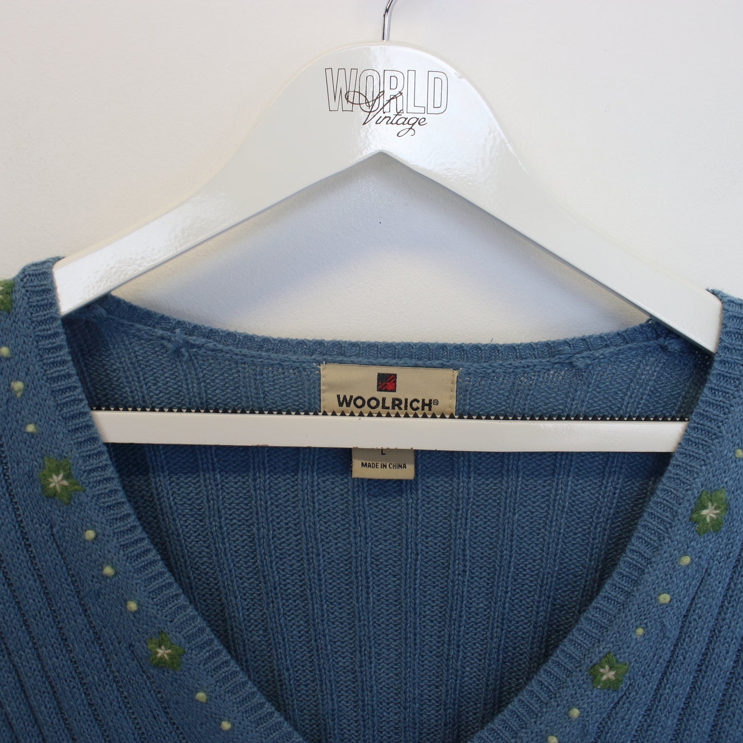 Vintage women's Woolrich knitted sweatshirt in blue. Best fits S