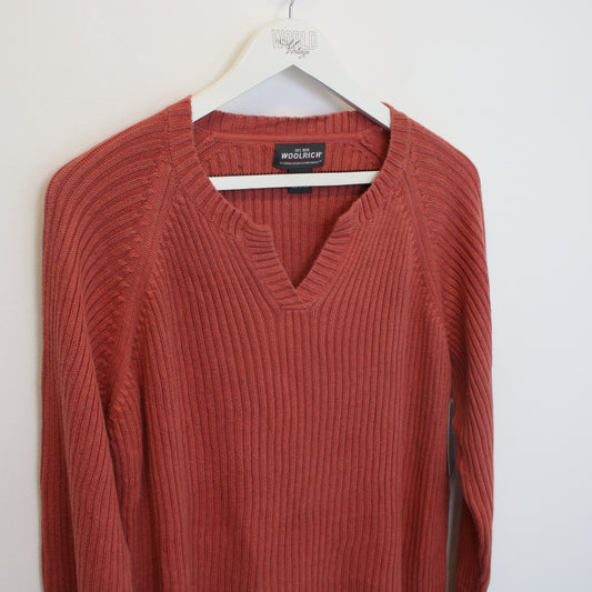 Vintage women's Woolrich knitted sweatshirt in red. Best fits M