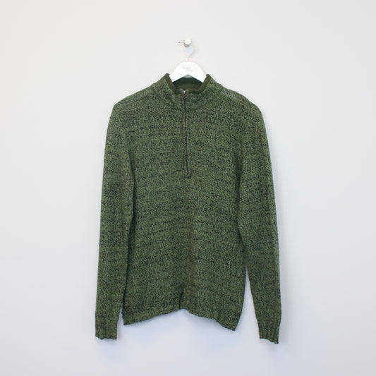 Vintage women's Woolrich knitted quarter zip sweatshirt in green. Best fits M