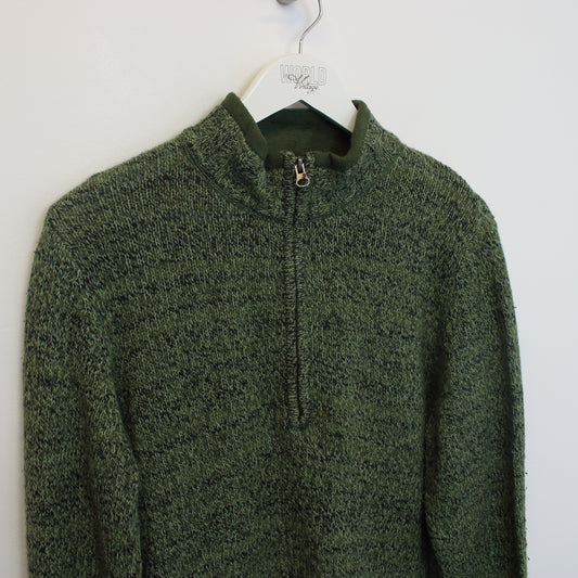 Vintage women's Woolrich knitted quarter zip sweatshirt in green. Best fits M