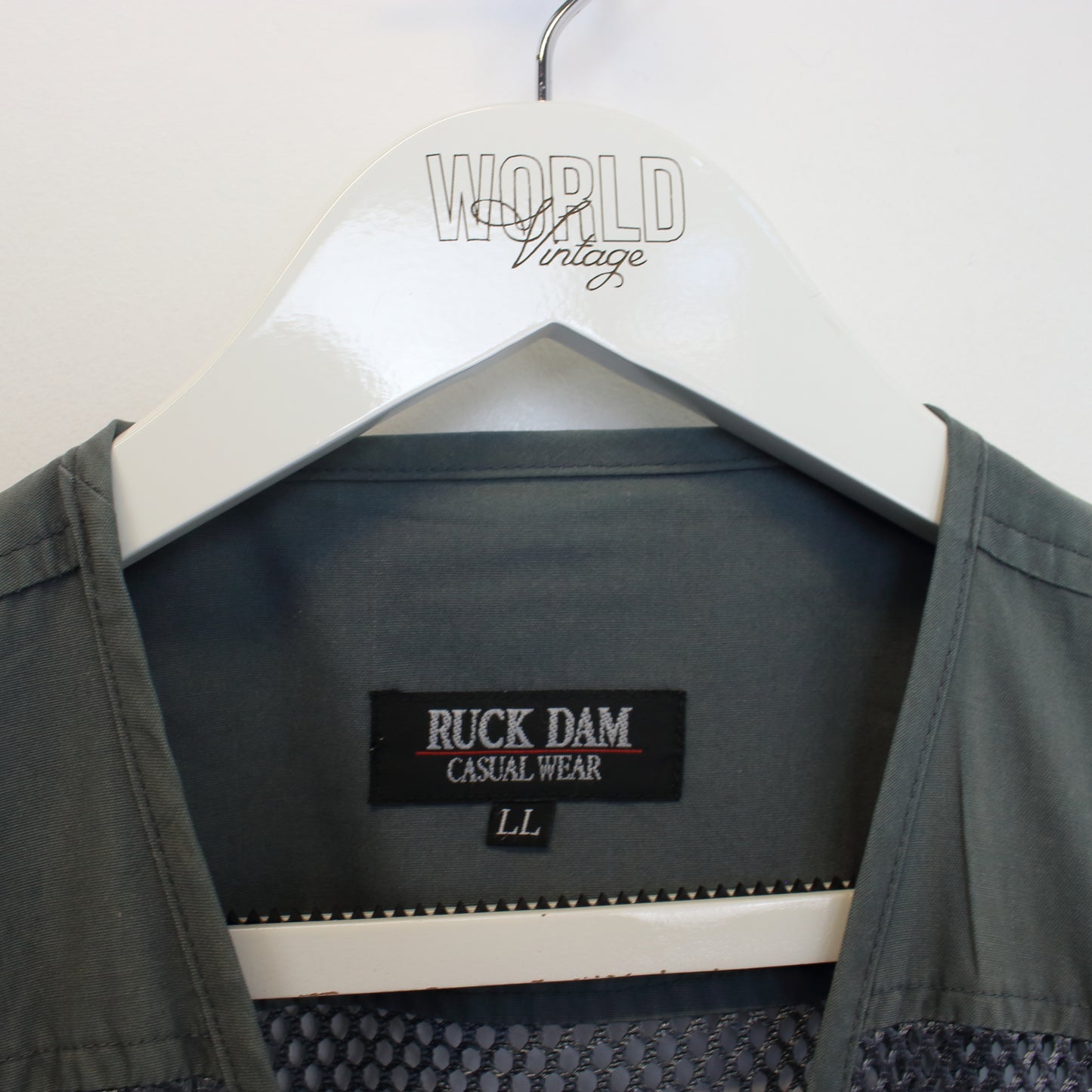 Vintage Ruck Dam mesh vest in grey. Best fits L