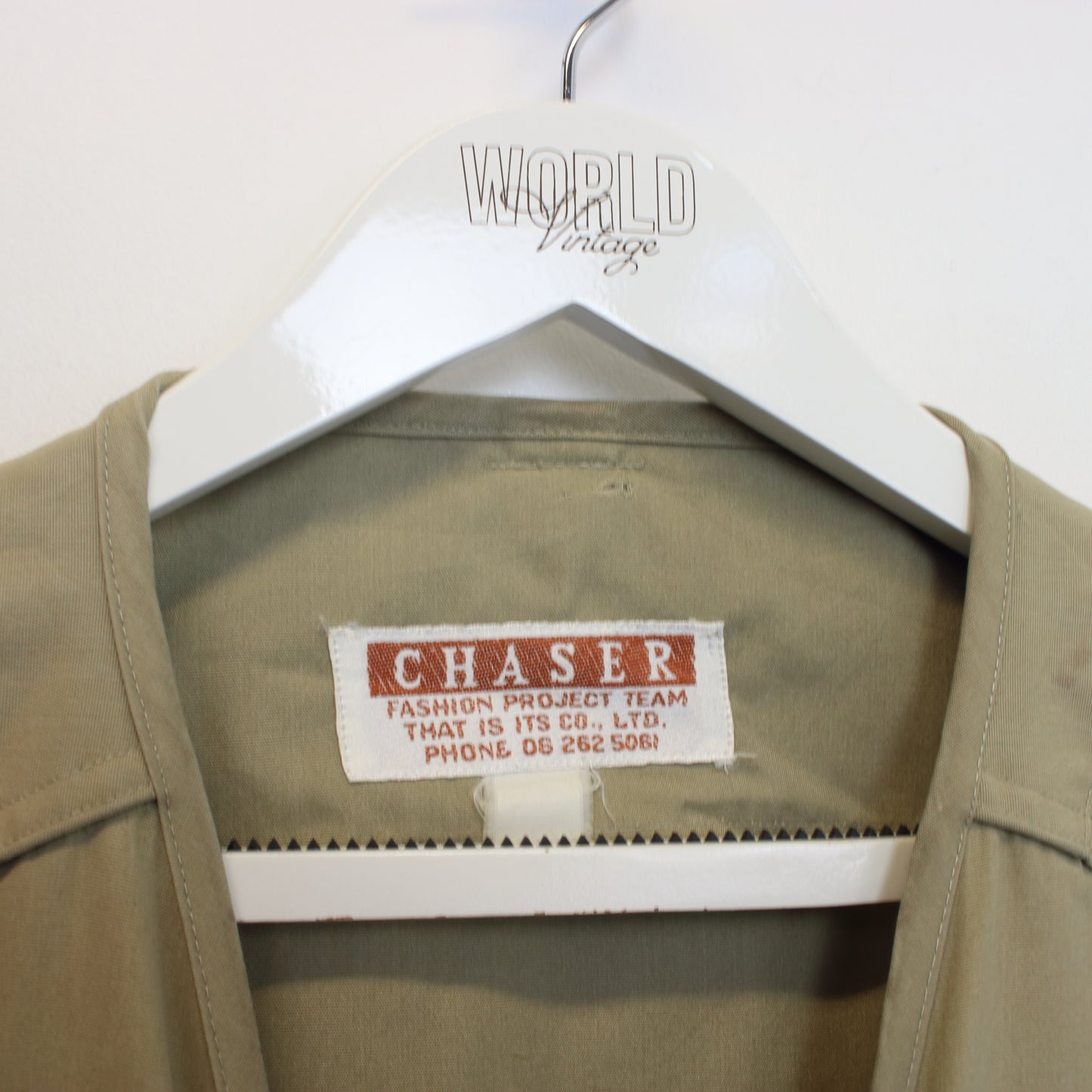 Vintage Chaser vest in brown. Best fits L