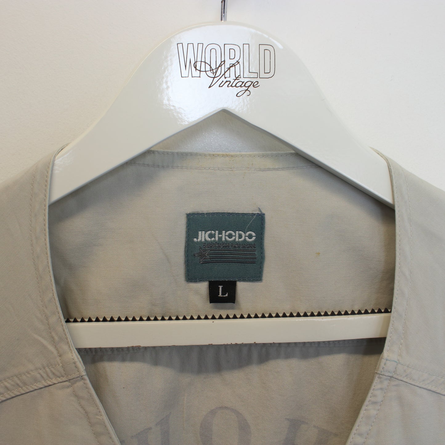 Vintage Jichodo vest in beige. Best fits M