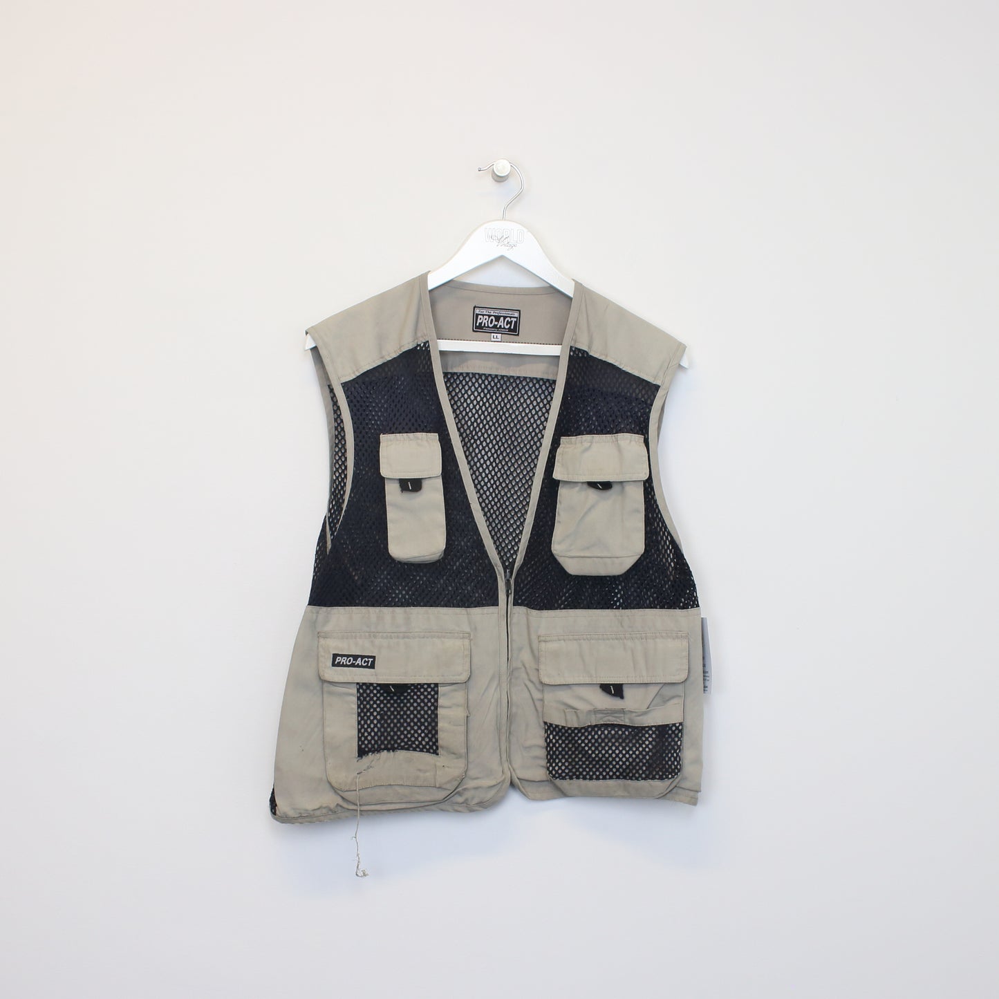 Vintage Pro Act vest in beige. Best fits M