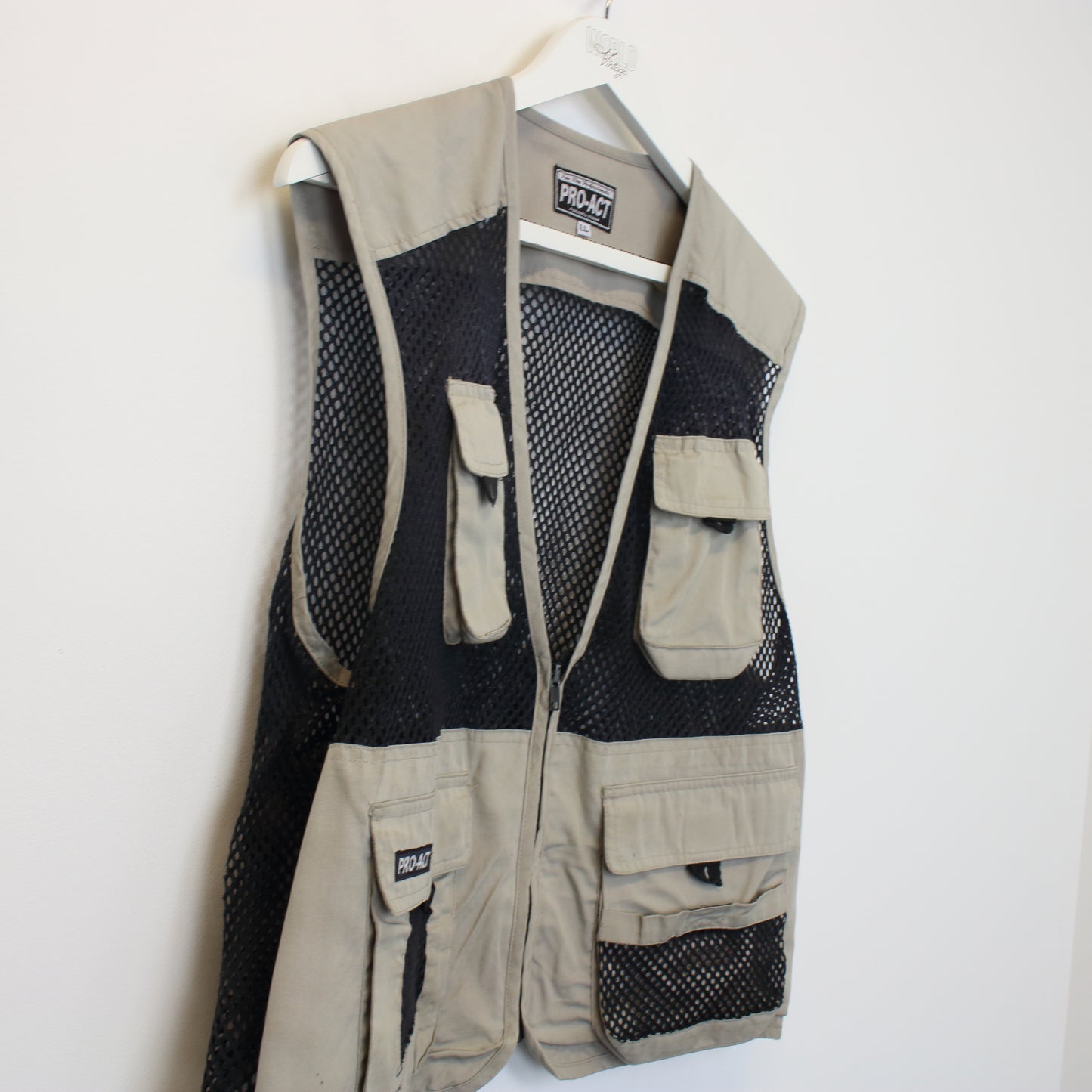 Vintage Pro Act vest in beige. Best fits M