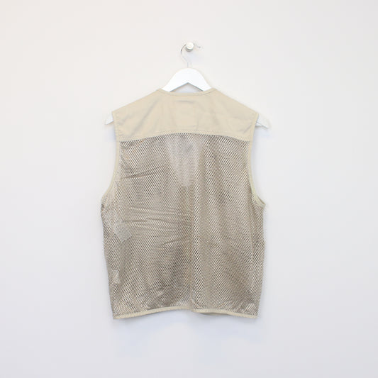 Vintage Nepuca vest in beige. Best fits M