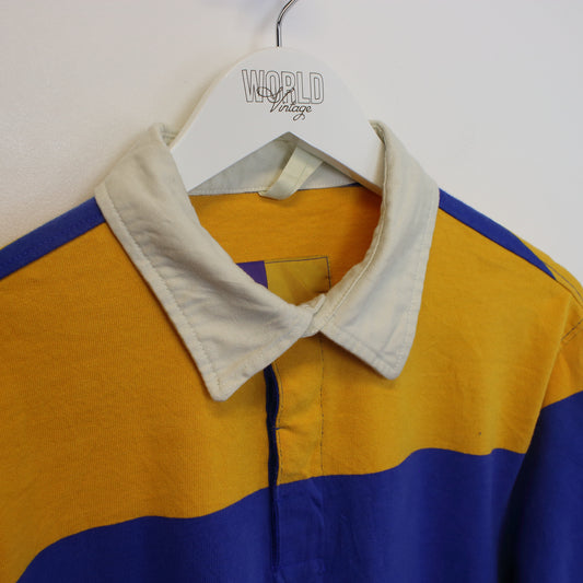 Vintage The North Face rugby shirt in blue and yellow. Best fits S